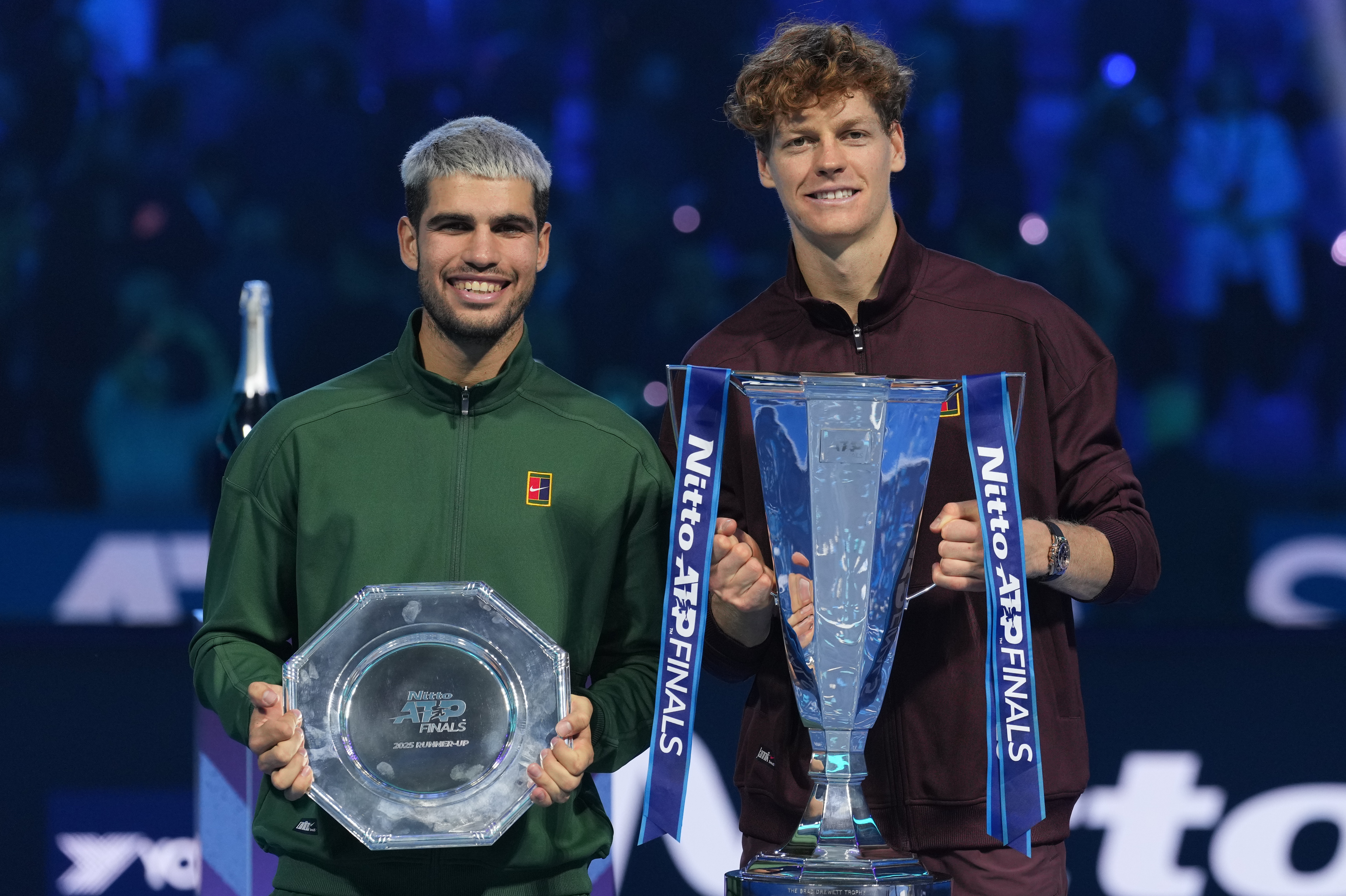 Spain's Carlos Alcaraz, left, and winner Italy's Jannik Sinner.