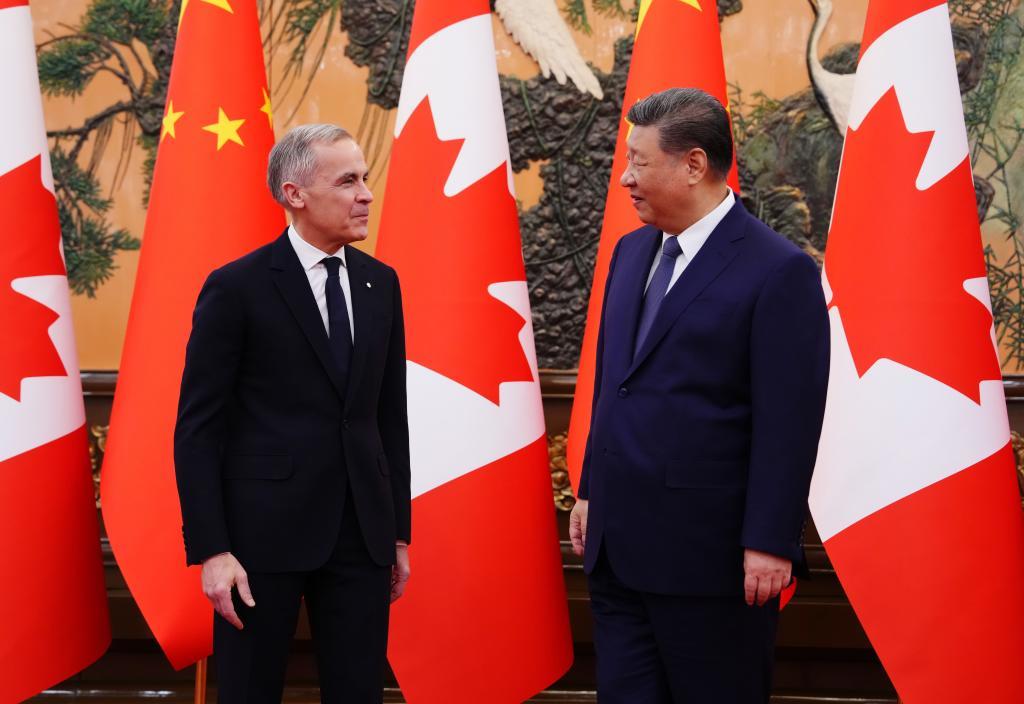 Canada's Prime Minister Mark Carney, left, meets with Chinese President Xi Jinping