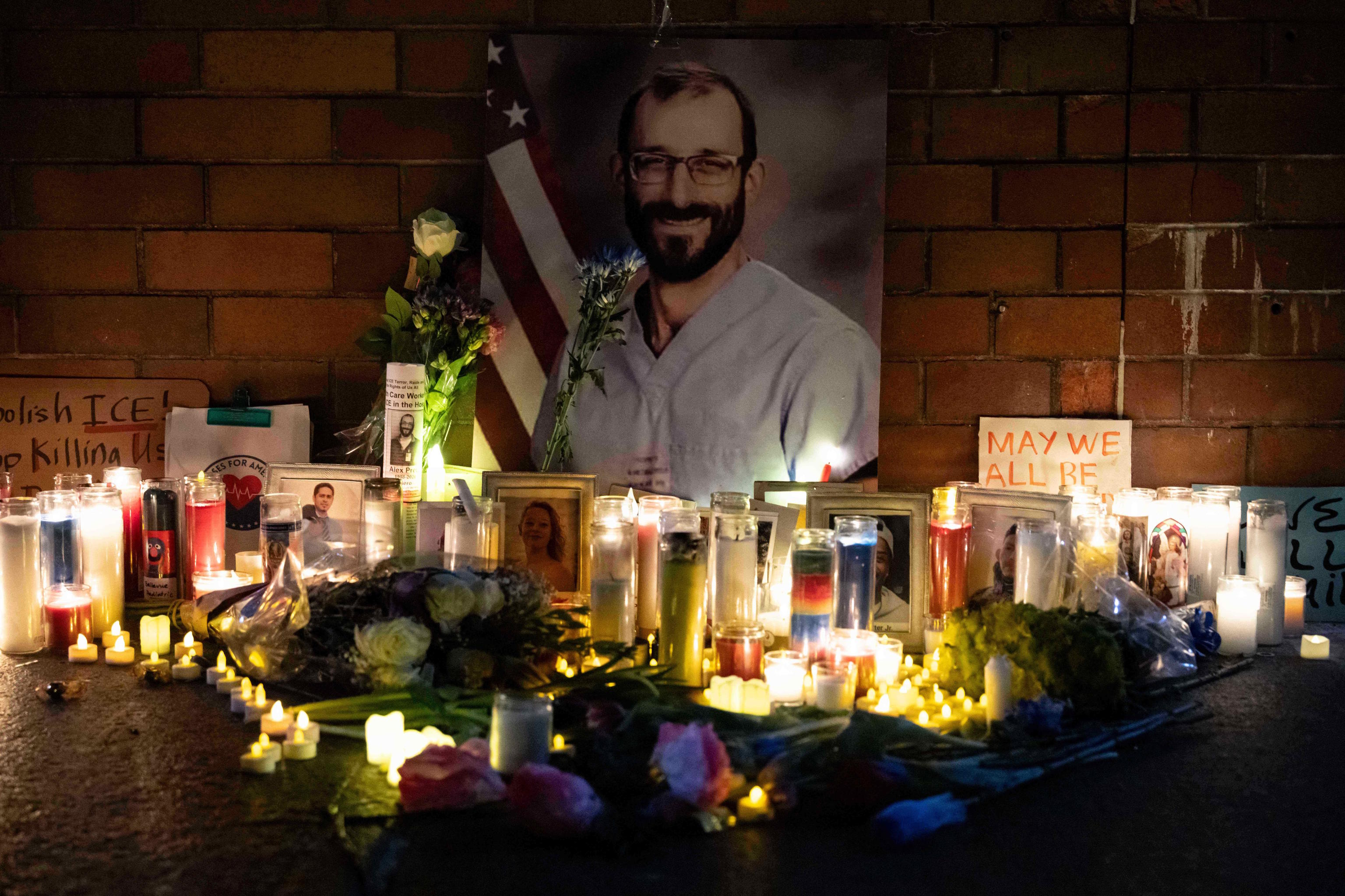 A makeshift memorial is seen after a vigil for Alex Pretti.