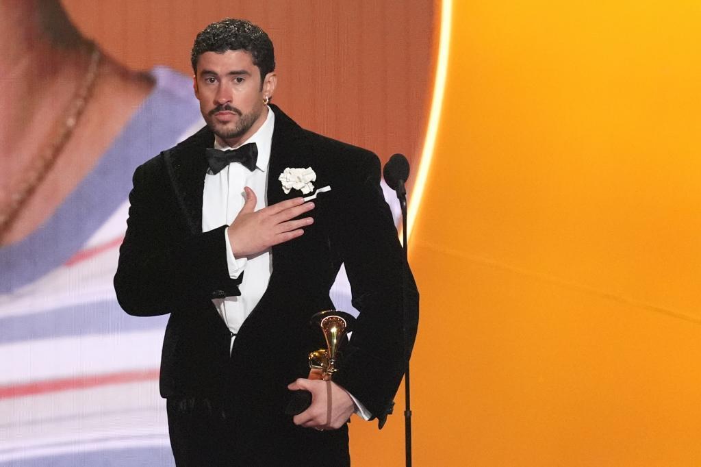 Bad Bunny accepts the award for album of the year for "Debí Tirar Más Fotos"