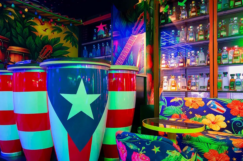 The cocktail bar on Echegaray Street, flying the Puerto Rican flag.