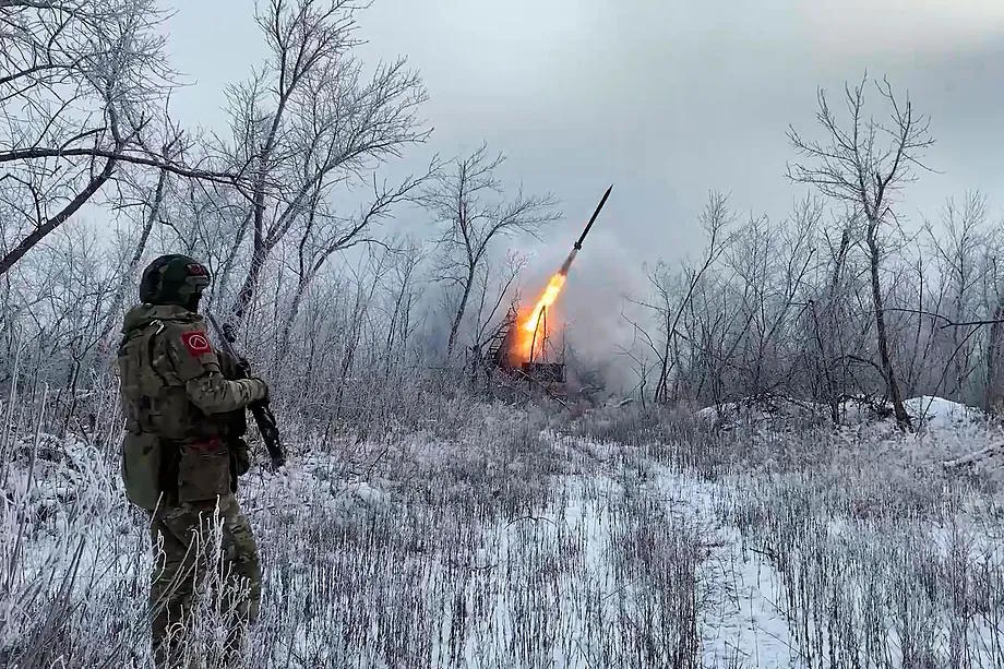 A Russian soldier observes the missile launch.