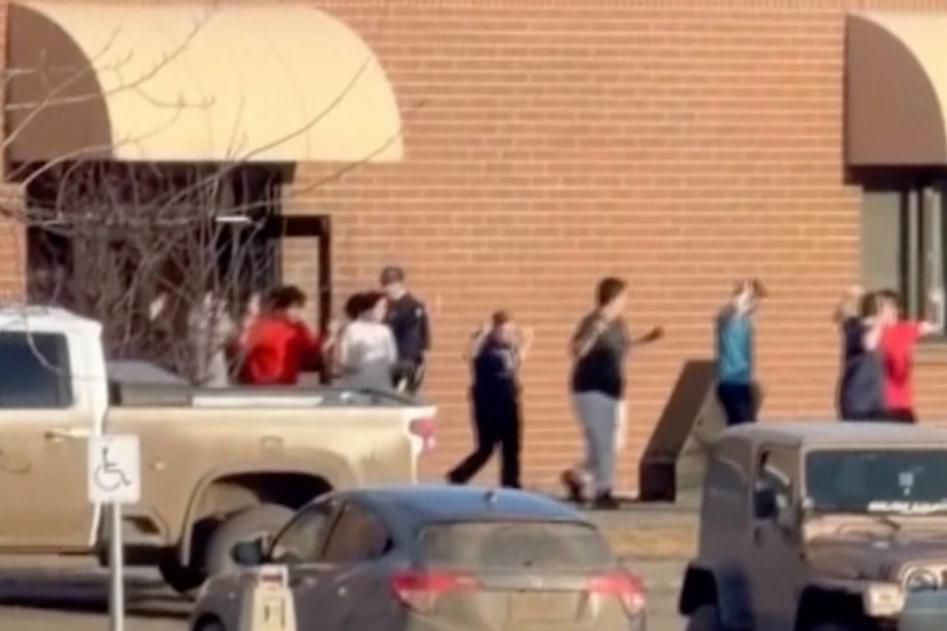 This grab from video shows students exiting the Tumbler Ridge school after deadly shootings, in British Columbia, Canada