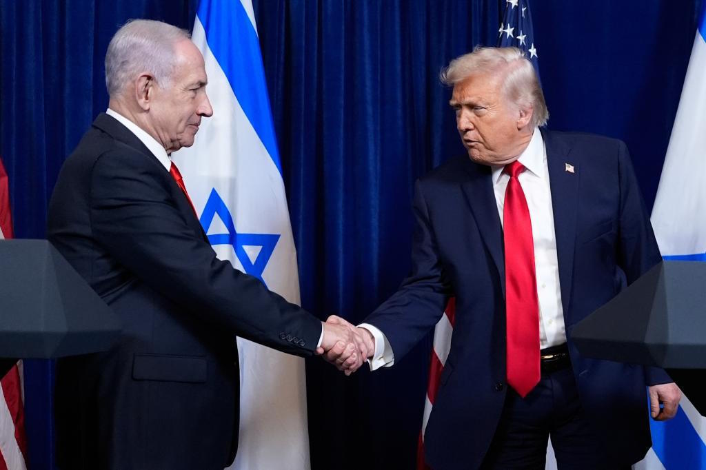 President Donald Trump shakes hands with Israel's Prime Minister Benjamin Netanyahu.