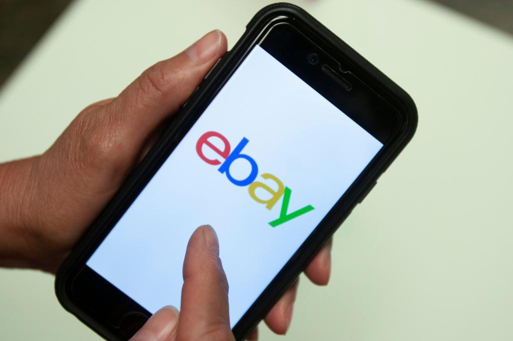 An Ebay app logo is shown on a mobile.