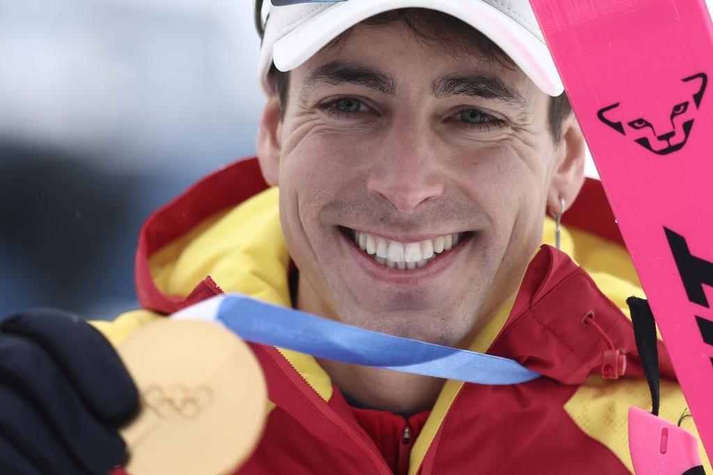 Spain's Oriol Cardona Coll celebrates winning the gold medal.