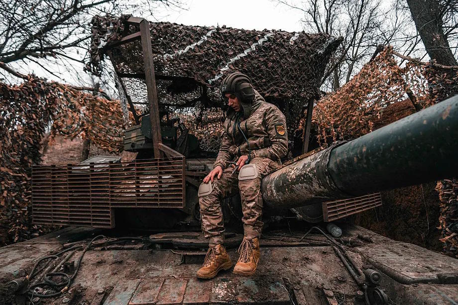 Ukrainian troops deployed in winter near the battlefront of Kharkiv and Donetsk.