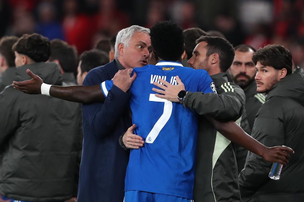 Vinicius, Real Madrid player, and Mourinho, Benfica coach.
