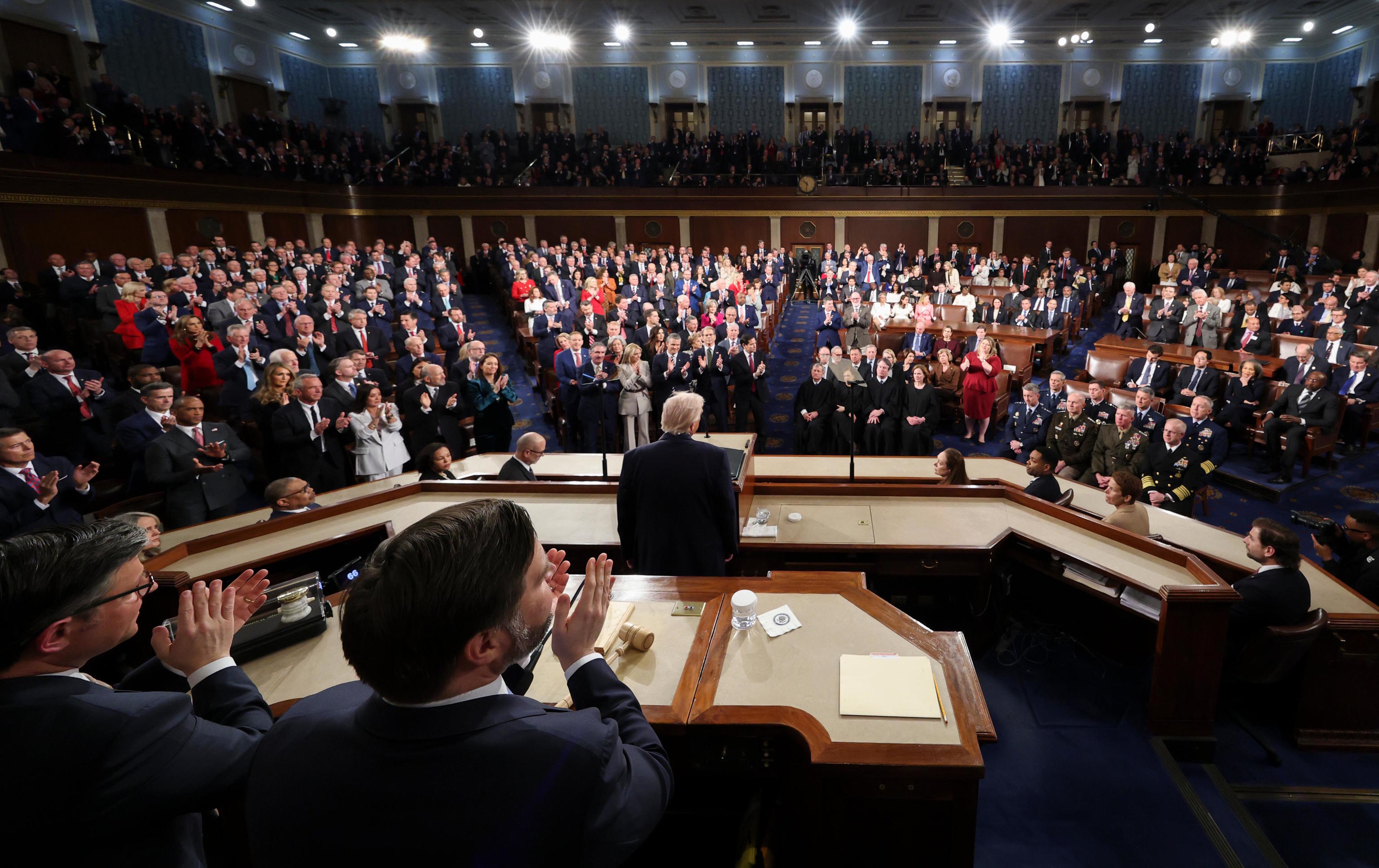 Members of Congress give a standing ovation during President Trump's.