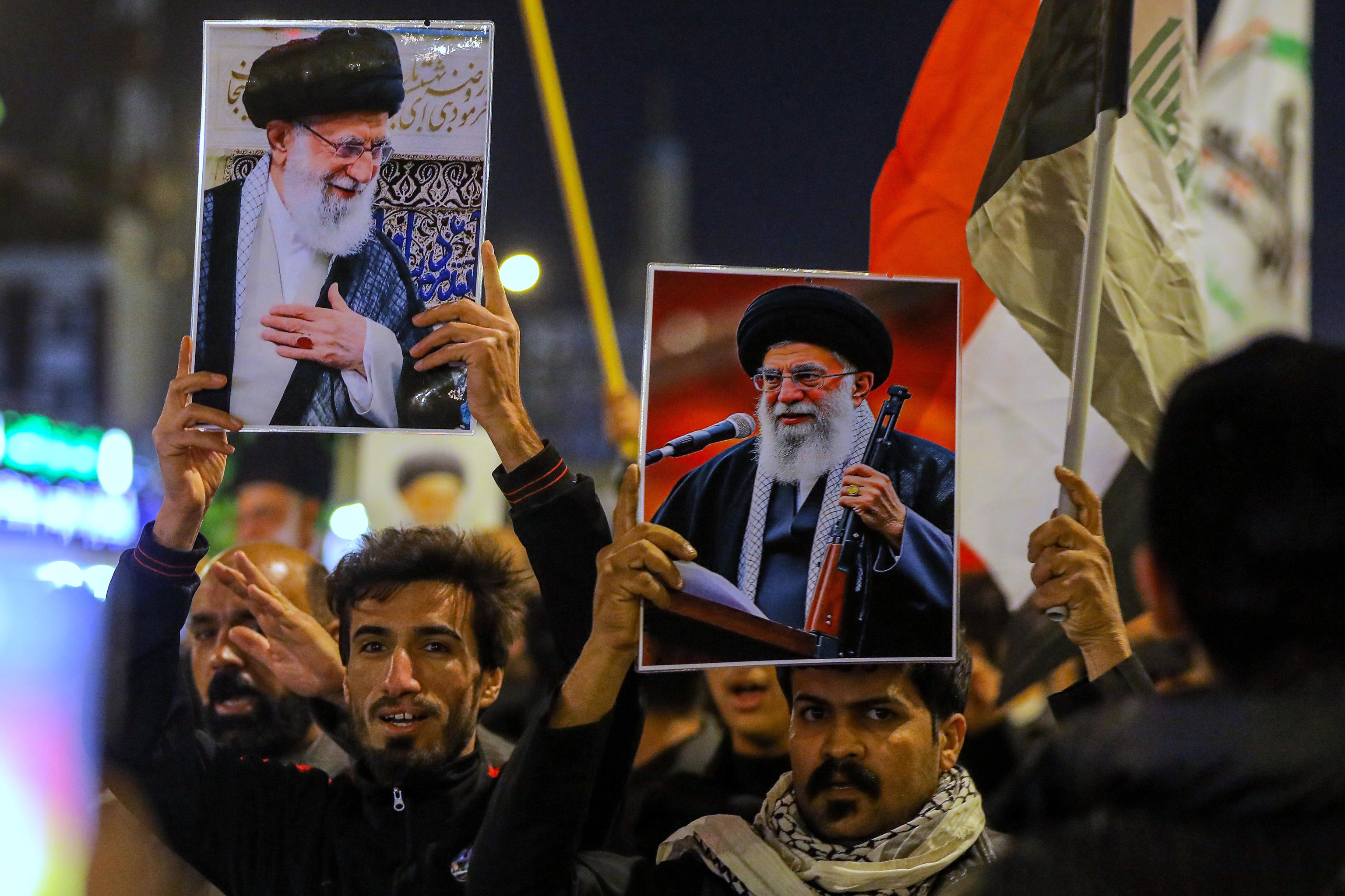 Iraqi Shiites hold images of the Iranian Supreme Leader, Ayatollah Ali Khamenei, killed by a US attack in Tehran.