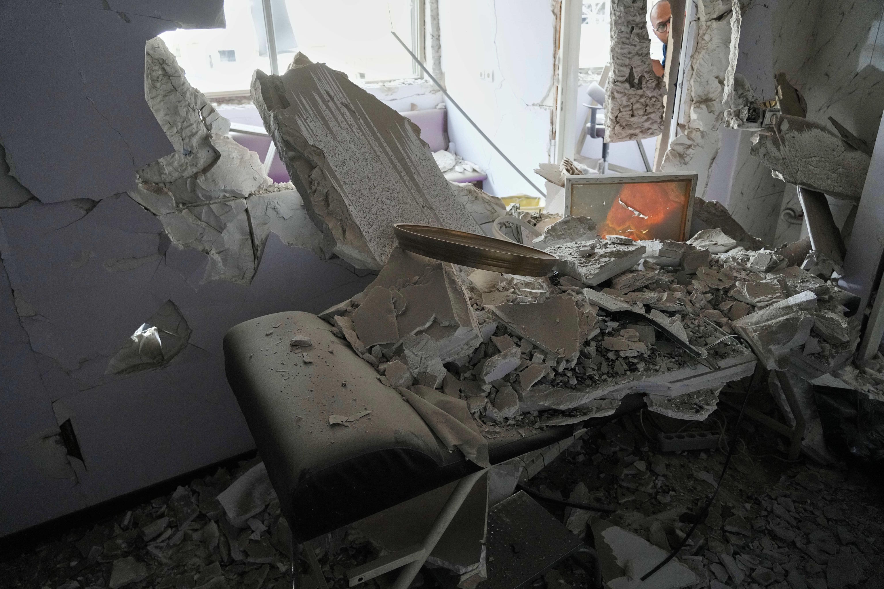 Debris is seen in a room of Gandhi Hospital, which was damaged.