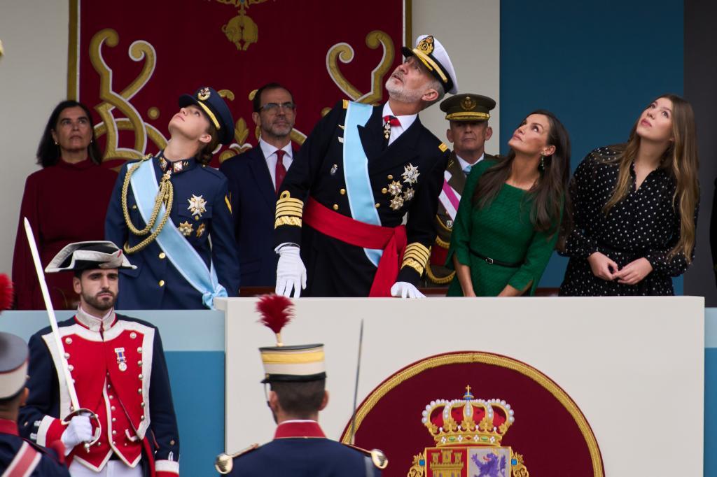 Spain's King Felipe VI, center, Princess Leonor, left, Queen Letizia, second right, and Princess Sofia, right, attend the military parade marking 'Dia de la Hispanidad'
