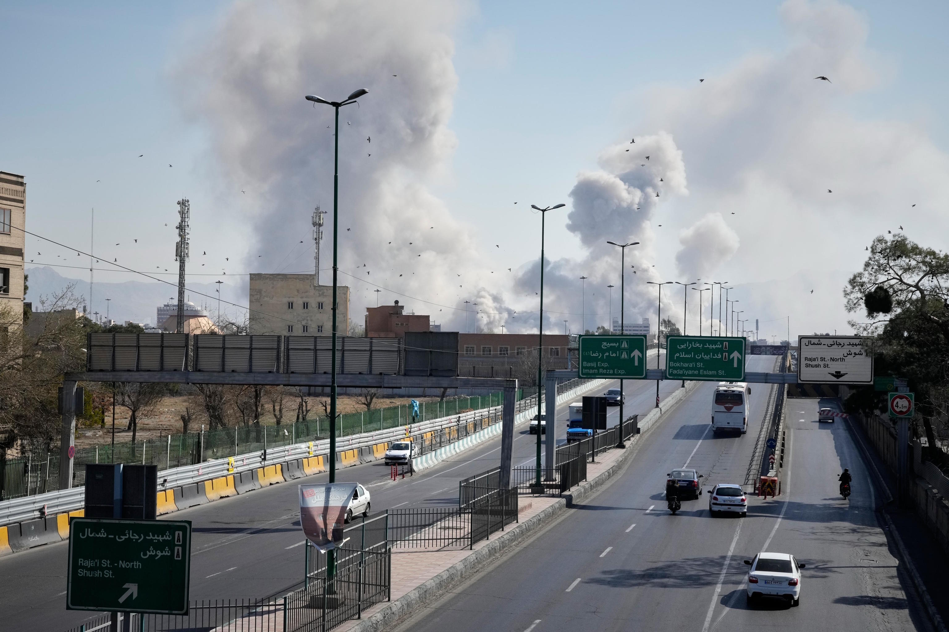 Smoke clouds in Tehran after an overnight airstrike.