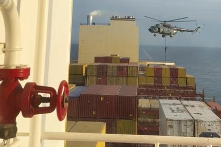 A helicopter raid targeting a vessel near the Strait of Hormuz.