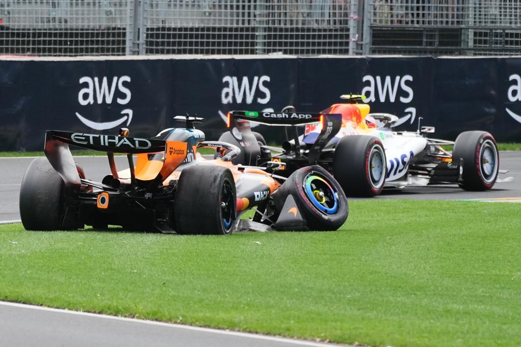McLaren driver Oscar Piastri of Australia's car sits on the track after he crashed during the formation lap ahead of the Australian Formula One Grand Prix