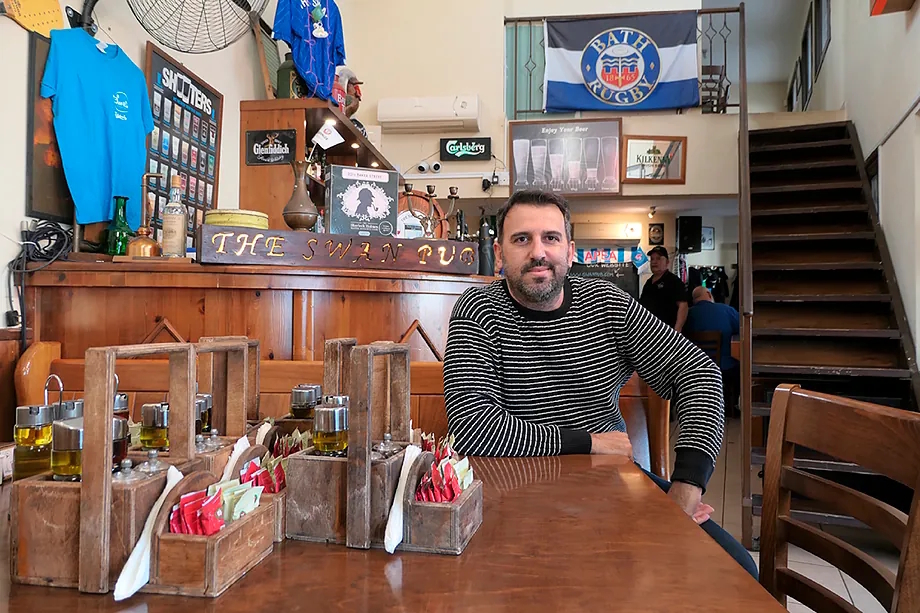 Makis, owner of Swan Akrotiri, in his pub.