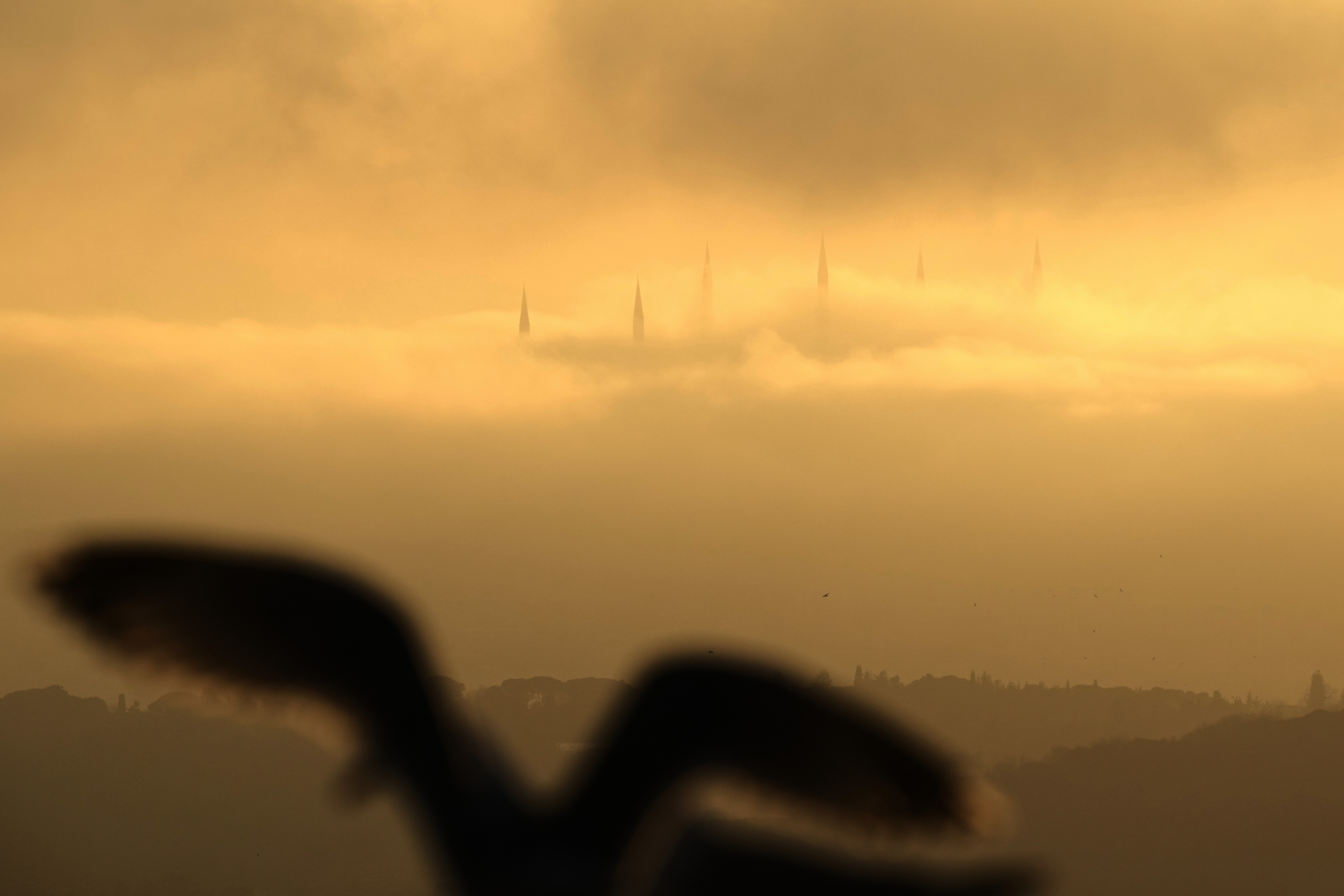 Morning fog engulfs the Camlica Mosque.