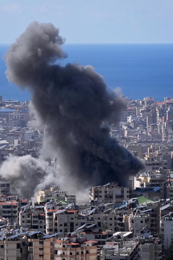 Smoke rises from an Israeli airstrike in Dahiyeh, Beirut's southern suburbs