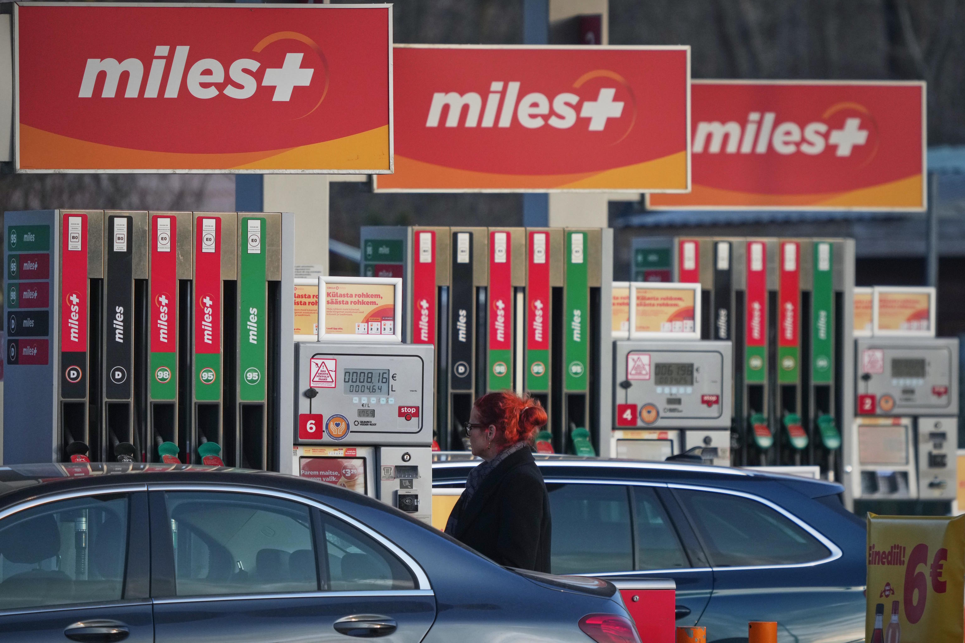 A person fills their vehicle at a gas station in Tallinn, Estonia.