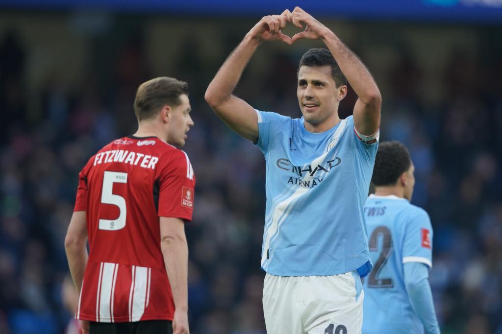 Manchester City's Rodrigo celebrates after scoring during the FA Cup third round match between Manchetster City and Exeter in Manchester