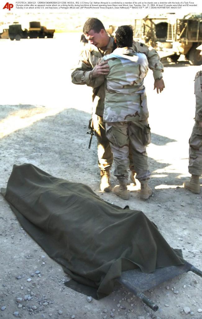 A dead body of a U.S. soldier after the attack suffered by the U.S. base in 2004 in Mosul, Iraq