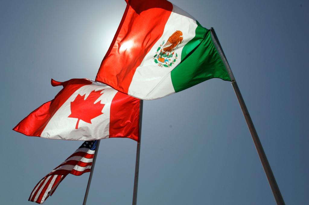 National flags representing the United States, Canada, and Mexico