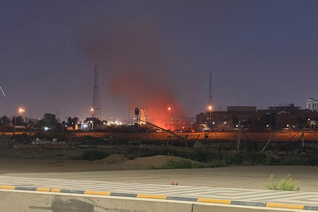 Flames appear to engulf a structure inside the compound of the U.S. Embassy in Baghdad,