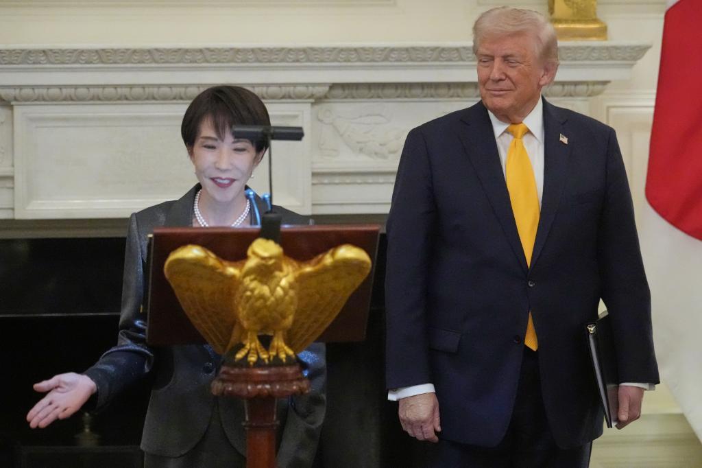 Japan's Prime Minister Sanae Takaichi speaks during a dinner with President Donald Trump