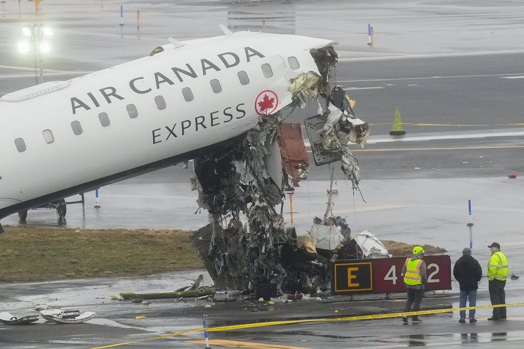 Air Canada jet came to rest after colliding with a Port Authority firetruck at LaGuardia Airport
