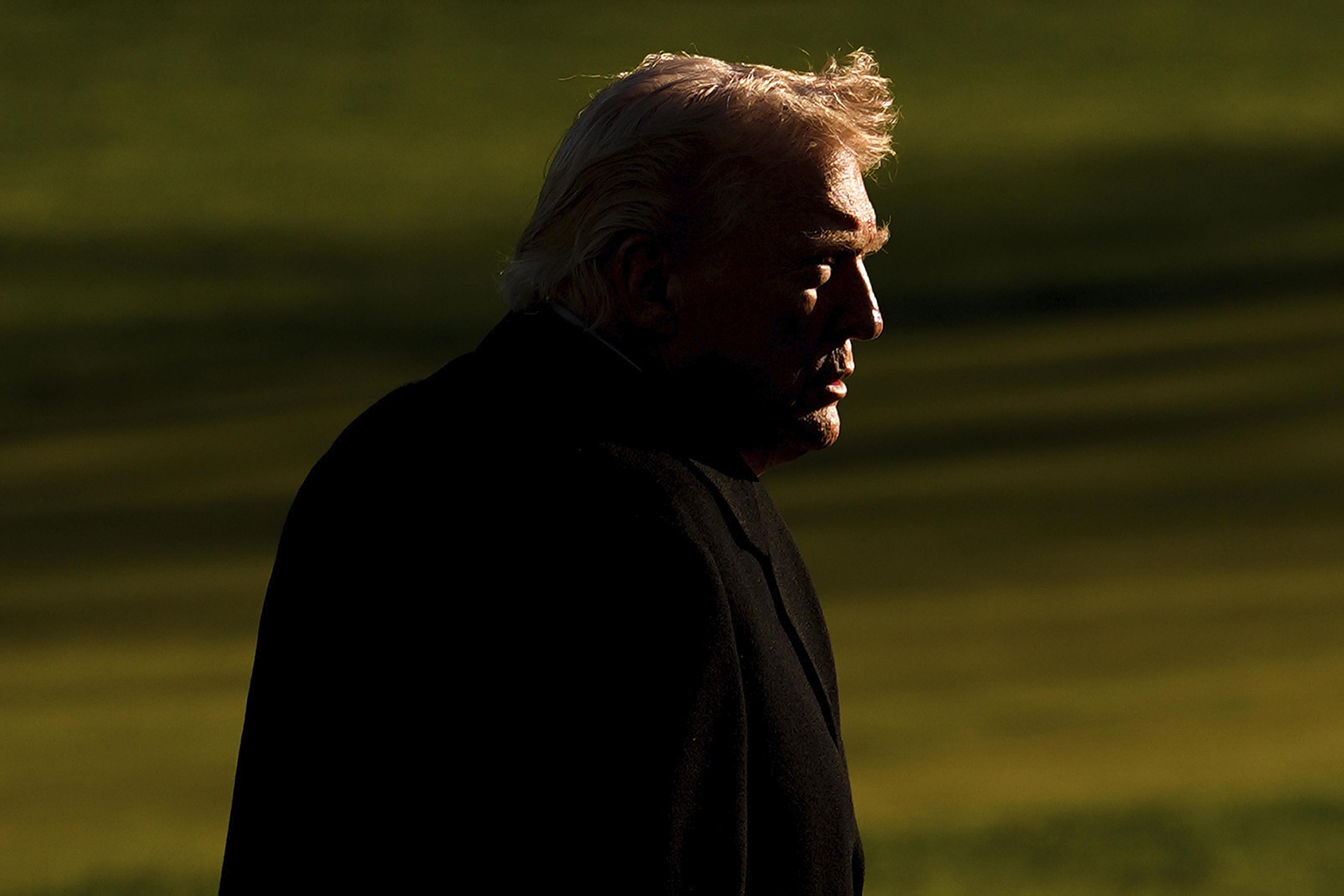 President Donald Trump arrives at the White House.