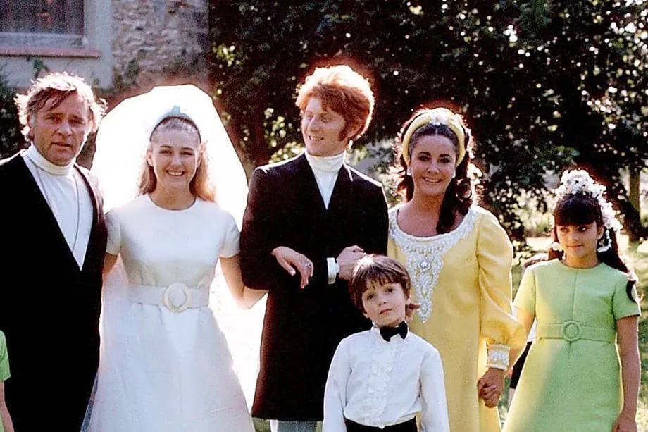 Richard Burton (left) and Elizabeth Taylor (holding hands with their daughter Liza Todd) were the wedding godparents of Gianni Bozzacchi and Claudie Ettori.