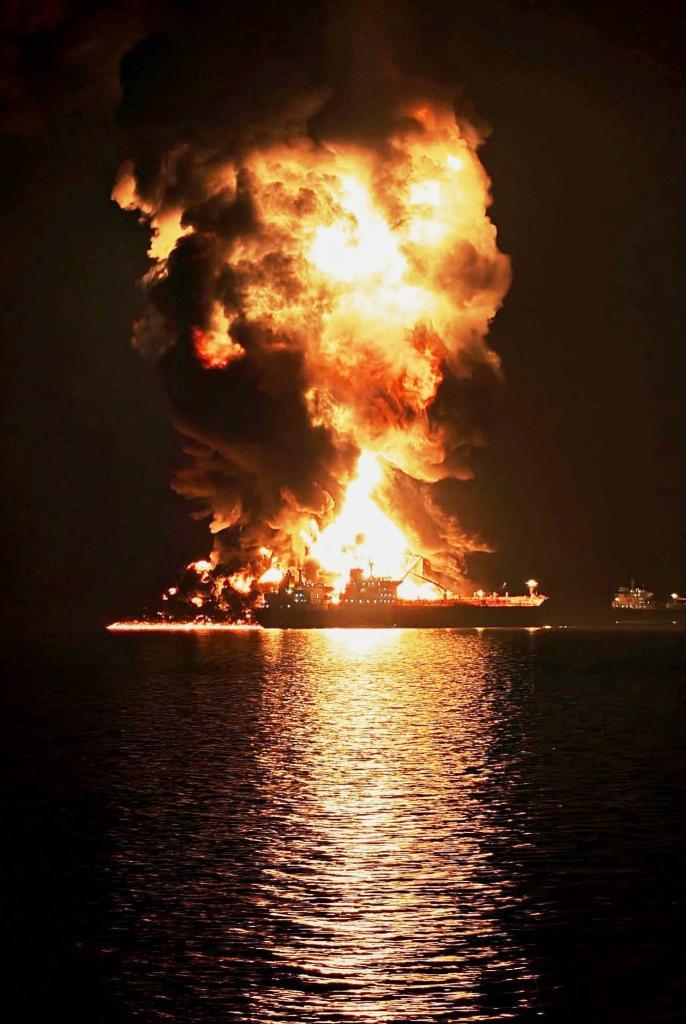 An oil tanker is on fire after being targeted in an Iranian attack
