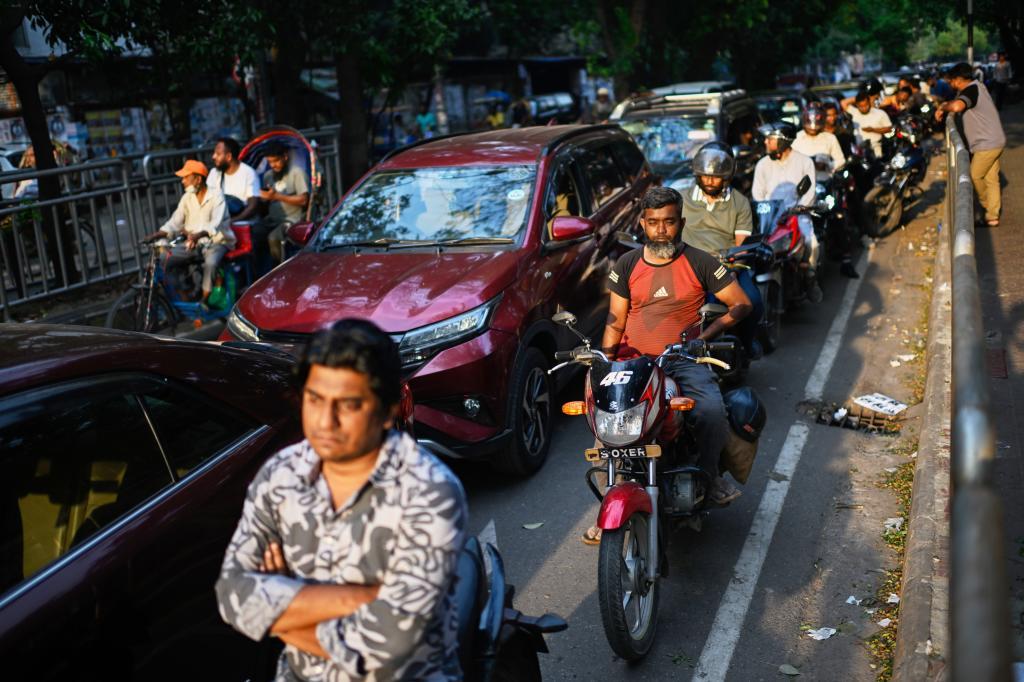 Motorists queue up outside a fuel pump in Dhaka, as Bangladesh tries to handle its energy crisis related to the Iran war