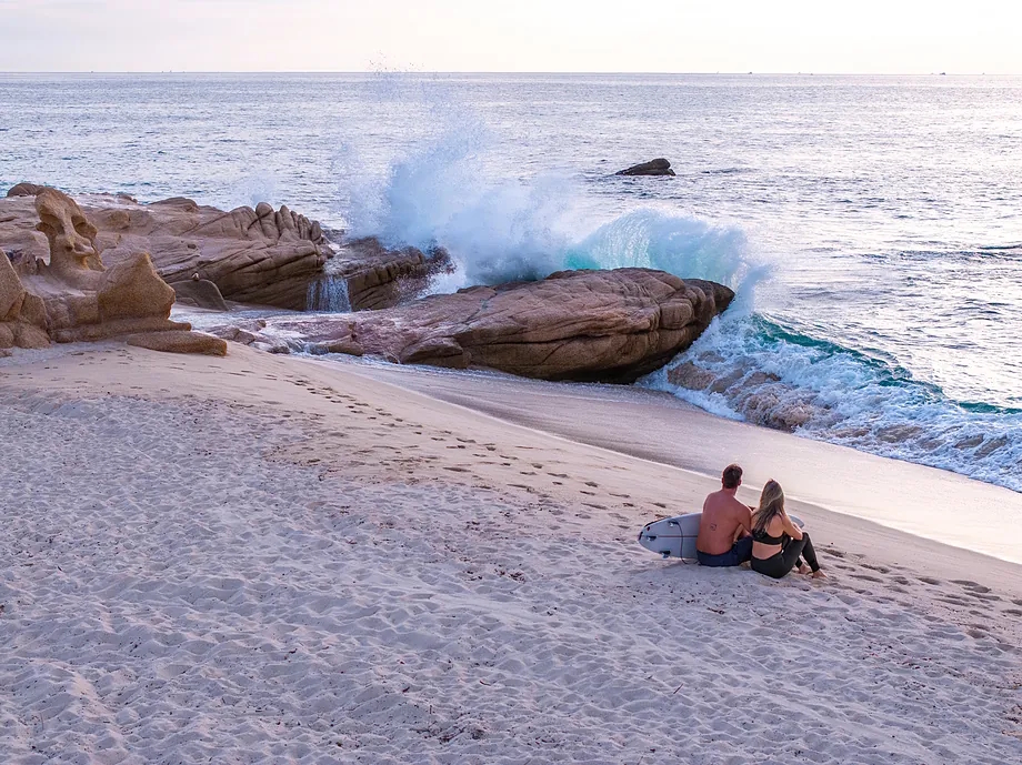 A couple of surfers in Cabo Pulmo.