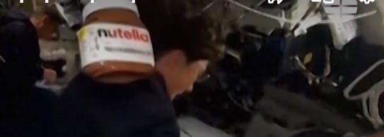 A jar of Nutella floating in zero gravity.