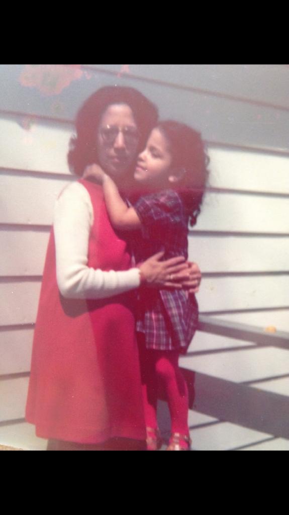 Carmen Rita Wong hugs her mother, Lupe.