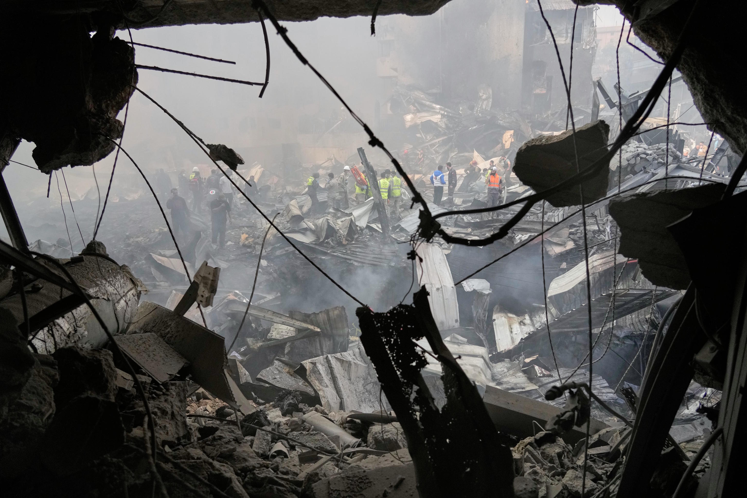 Smoldering debris at the site of an Israeli airstrike that struck a building in Beirut.