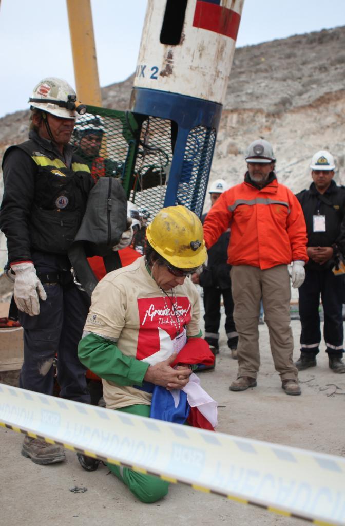 Chilean miner rescued after 70 days trapped underground.