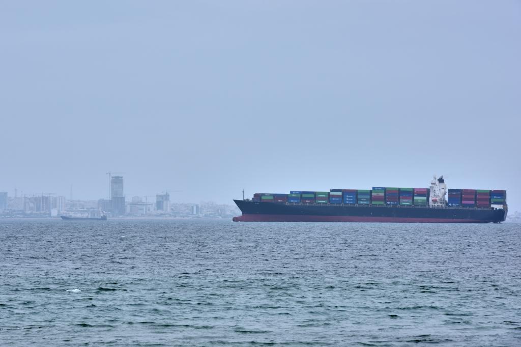 A container ship is seen in the Strait of Hormuz off the coast of Qeshm Island,
