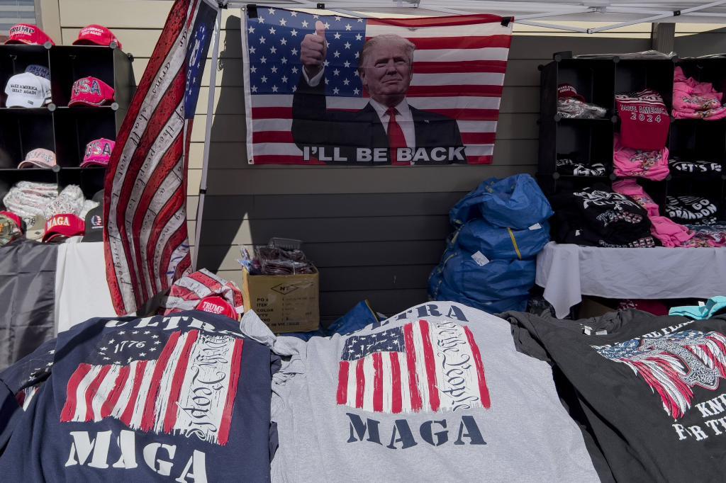 MAGA merchandise and a U.S. flag.