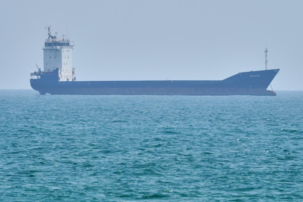 A tanker sits anchored in the Strait of Hormuz off the coast of Qeshm Island
