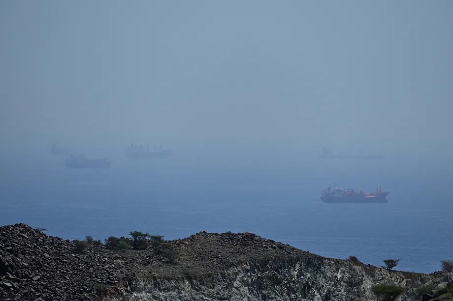 Tankers and cargo ships anchored in the Strait of Ormuz.