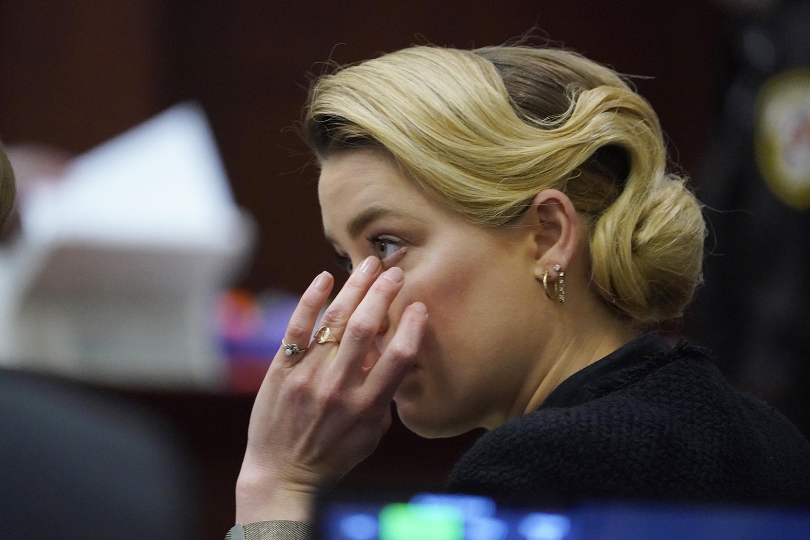Amber Heard into the courtroom at the Fairfax County Circuit in 2022.