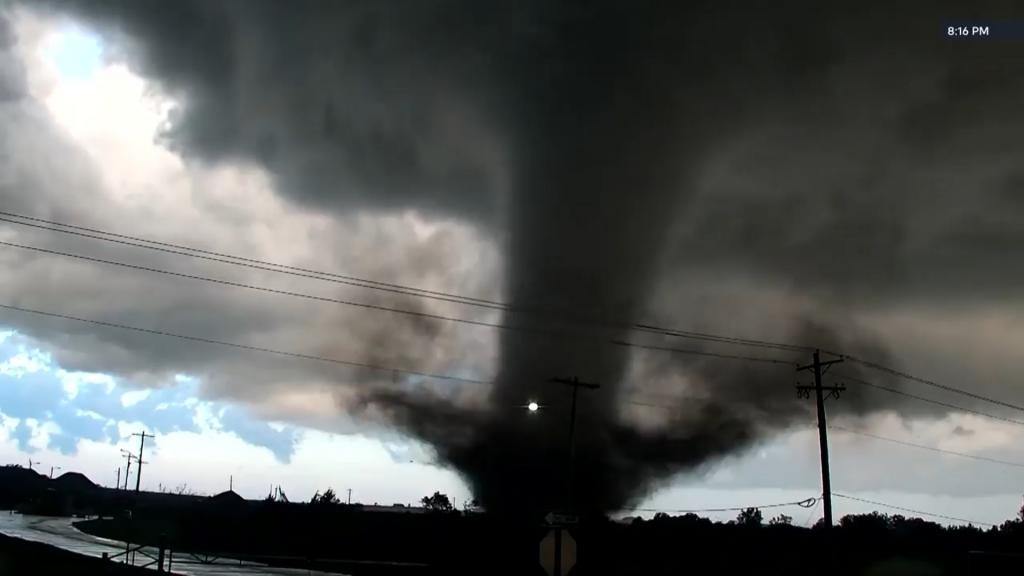 A tornado crosses a highway in Enid, Oklahoma.