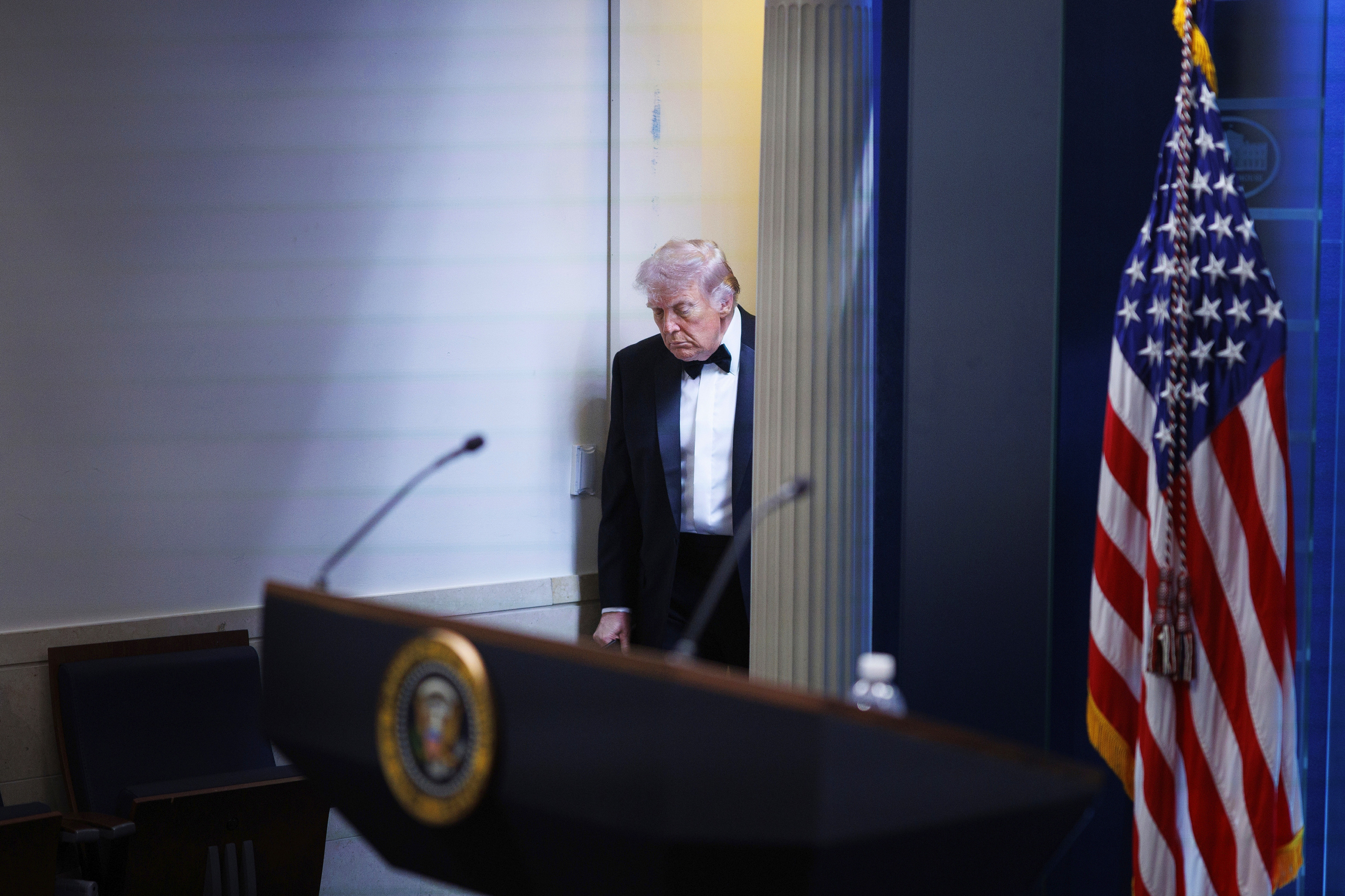 President Donald Trump arrives at the James Brady Press Briefing Room at the White House after a shooting incident.