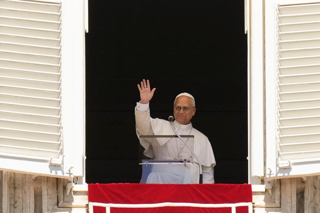 Pope Leo XIV appears at the window of his studio overlooking St. Peter's Square at the Vatican