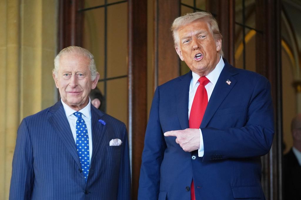President Donald Trump gestures next to Britain's King Charles III