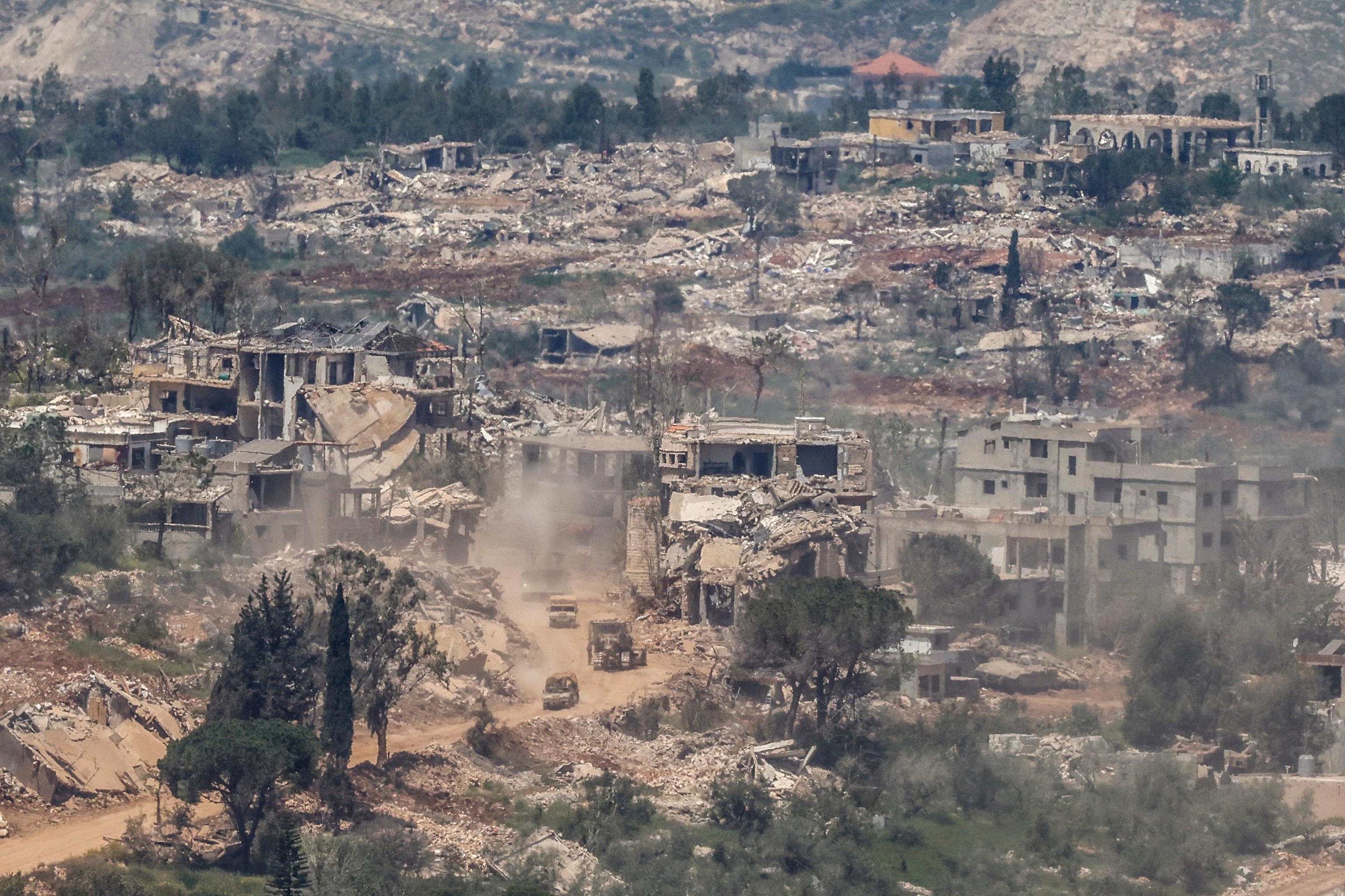Smoke rises as the Israeli army demolishes buildings and homes, in southern Lebanon.