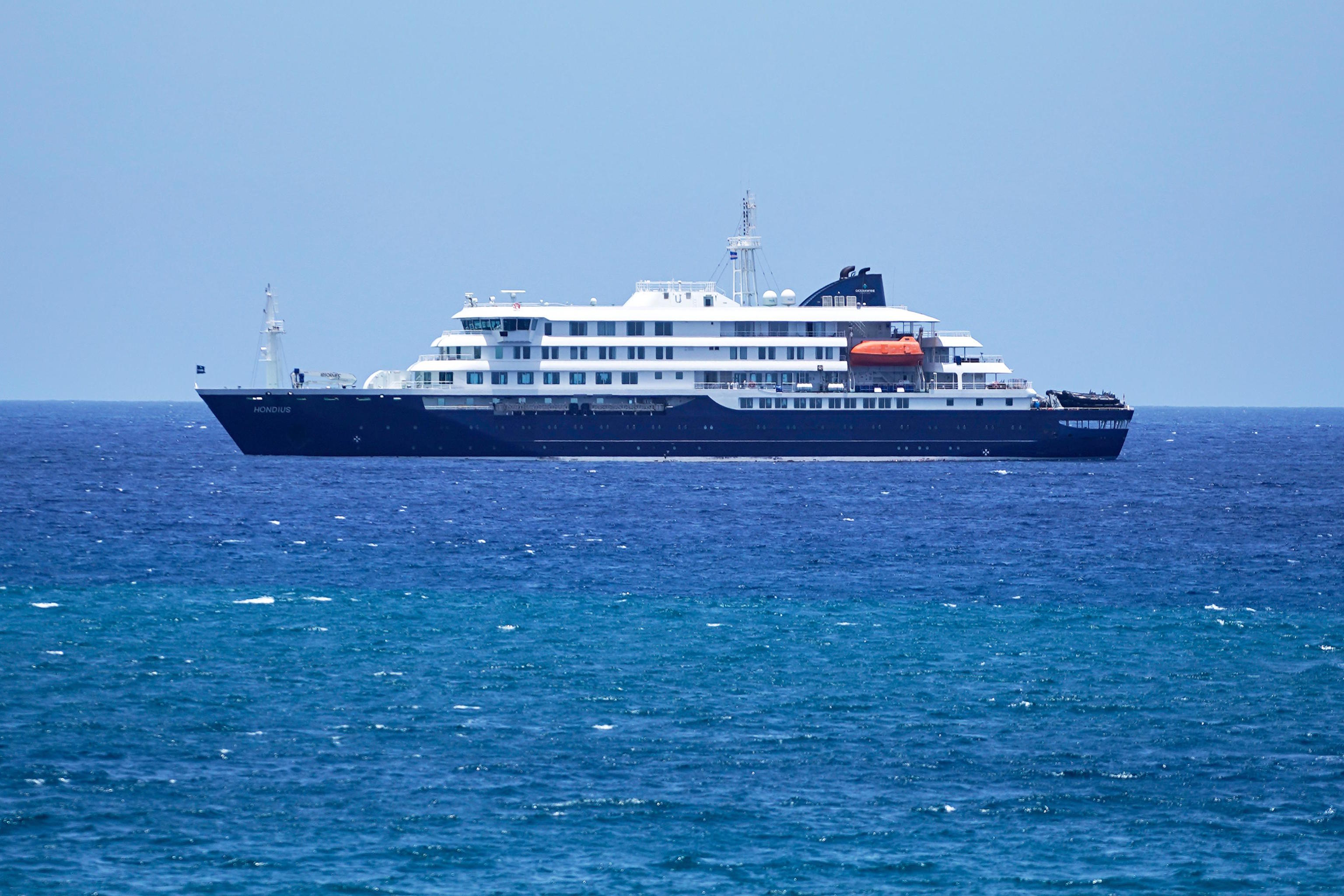 The MV Hondius cruise ship is anchored at a port in Praia, Cape Verde.
