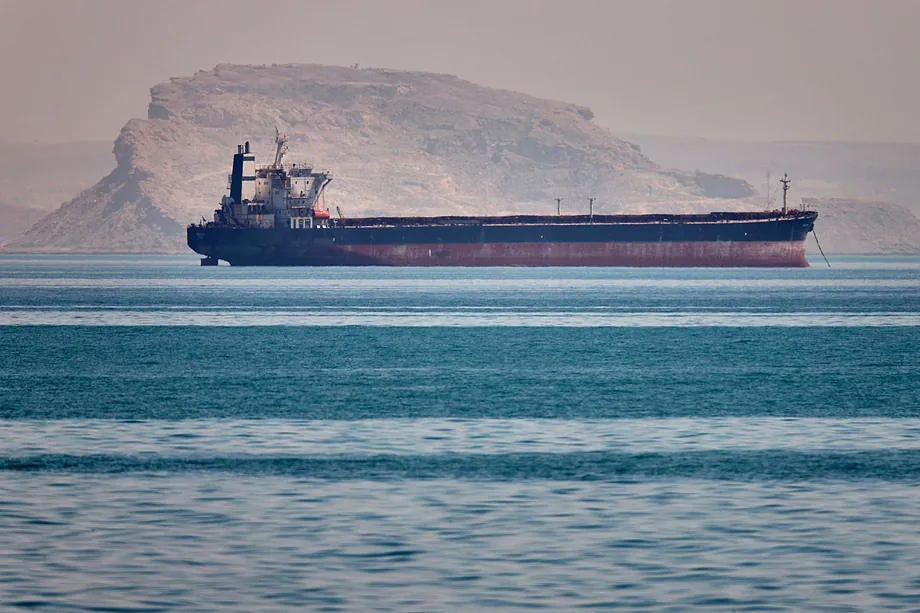 A cargo ship is seen anchored in the Strait of Hormuz near Bandar Abbas, Iran.